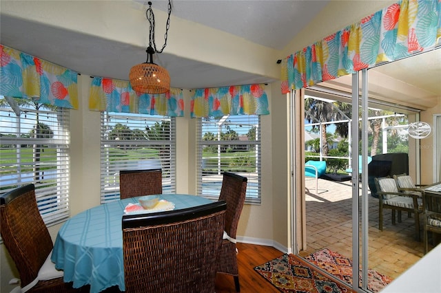 dining room with hardwood / wood-style flooring