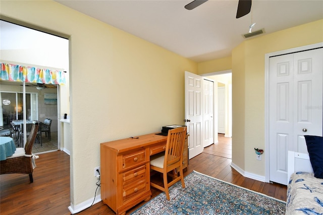 office with ceiling fan and dark hardwood / wood-style floors