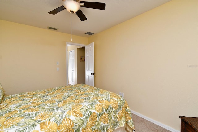 bedroom with ceiling fan and carpet