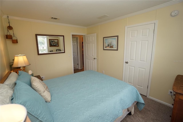 carpeted bedroom with ornamental molding