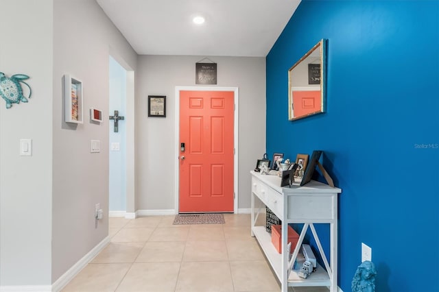 foyer with light tile patterned flooring