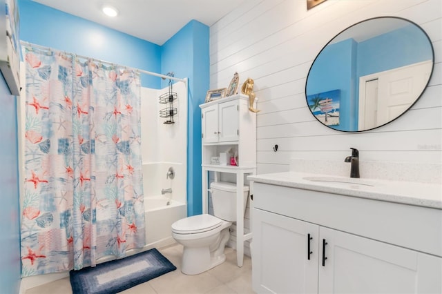 full bathroom with shower / bathtub combination with curtain, tile patterned flooring, wood walls, toilet, and vanity