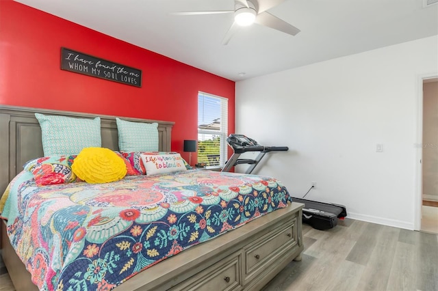 bedroom featuring ceiling fan and light hardwood / wood-style floors