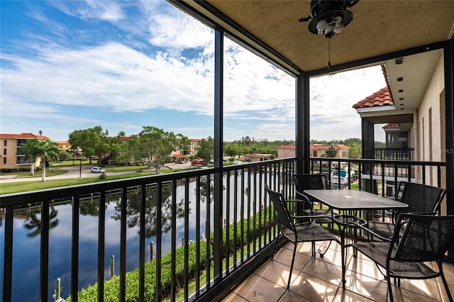 balcony featuring a water view