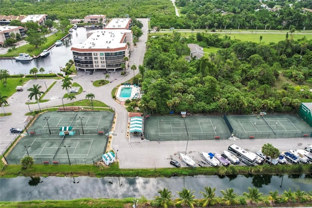 birds eye view of property featuring a water view