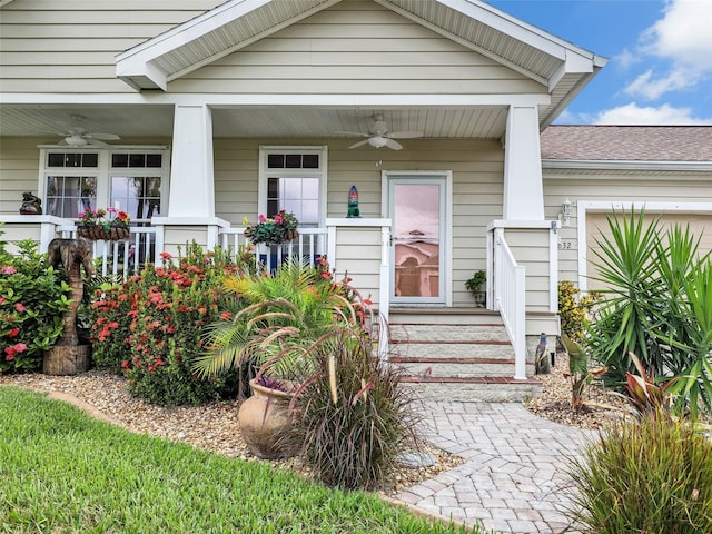 view of exterior entry featuring ceiling fan and a porch