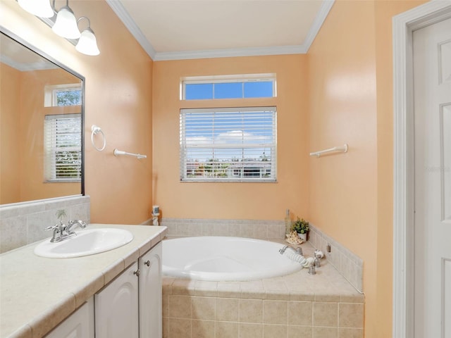 bathroom featuring vanity, crown molding, and tiled bath