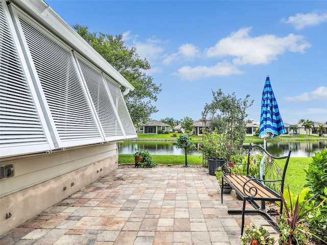 view of patio / terrace with a water view