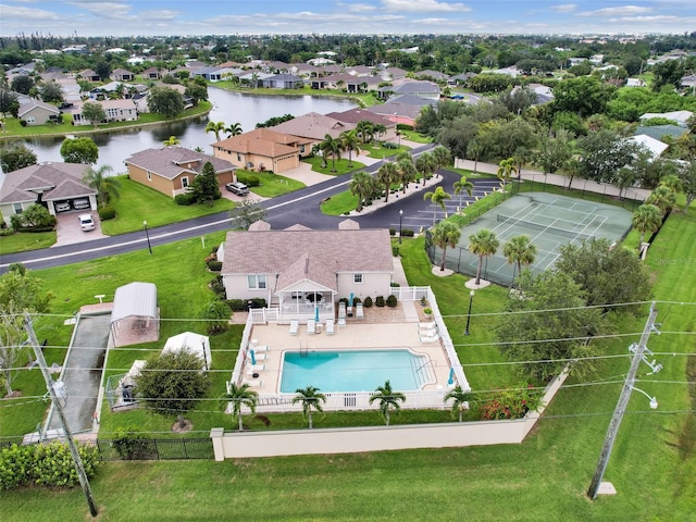 birds eye view of property featuring a water view