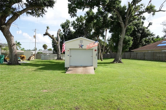 view of yard with a storage unit