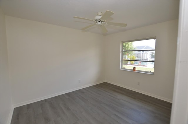 515 Allworthy St, Port Charlotte, FL 33954 - unfurnished room featuring dark wood-type flooring, ceiling fan, and baseboards