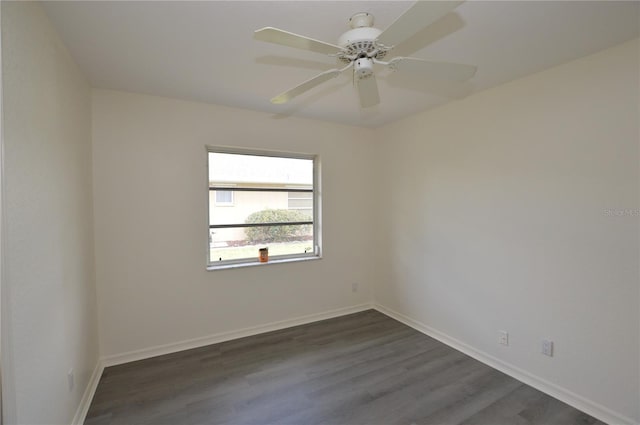 515 Allworthy St, Port Charlotte, FL 33954 - spare room featuring dark wood-style flooring, baseboards, and ceiling fan