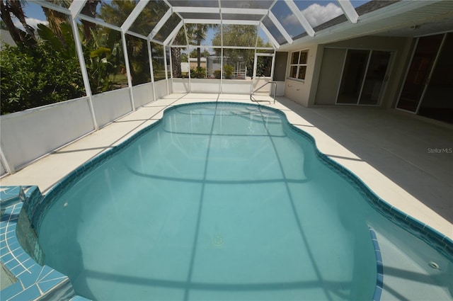 515 Allworthy St, Port Charlotte, FL 33954 - outdoor pool featuring glass enclosure and a patio
