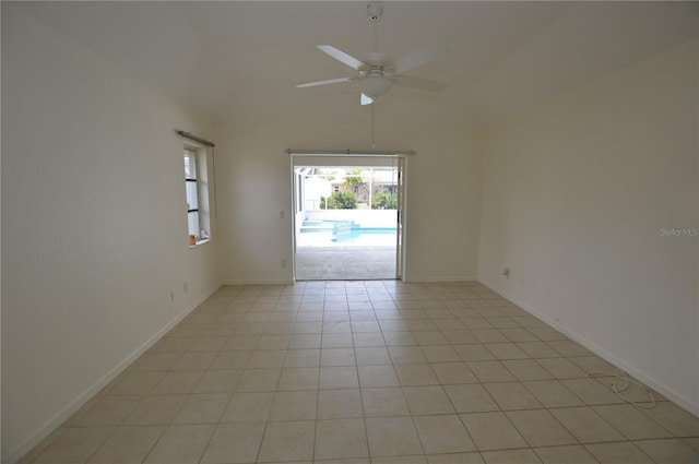 515 Allworthy St, Port Charlotte, FL 33954 - unfurnished room with baseboards, a ceiling fan, and vaulted ceiling