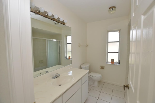 515 Allworthy St, Port Charlotte, FL 33954 - bathroom featuring baseboards, toilet, an enclosed shower, vanity, and tile patterned floors