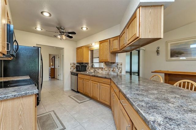 kitchen featuring dishwasher, tasteful backsplash, sink, light tile patterned flooring, and ceiling fan