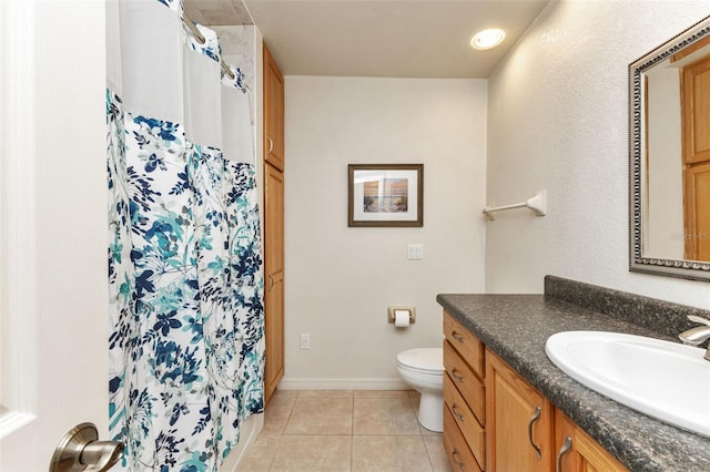 bathroom featuring a shower with curtain, toilet, tile patterned flooring, and vanity