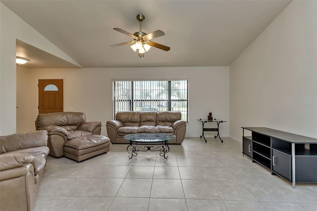 tiled living room with ceiling fan and lofted ceiling