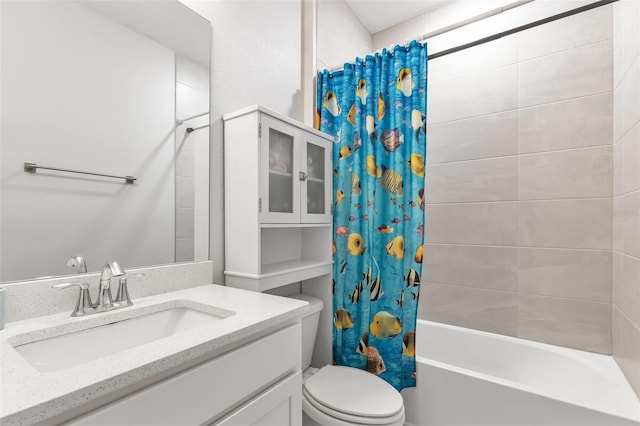 16195 Maya Cir, Punta Gorda, FL 33955 - bathroom featuring vanity, shower / tub combo with curtain, and toilet