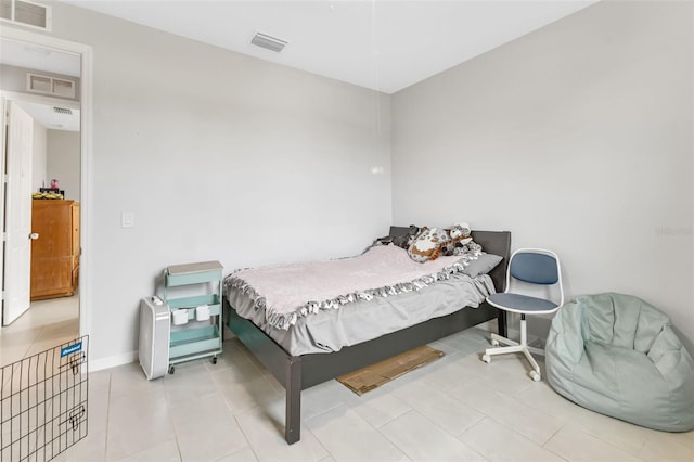 16195 Maya Cir, Punta Gorda, FL 33955 - tiled bedroom with baseboards