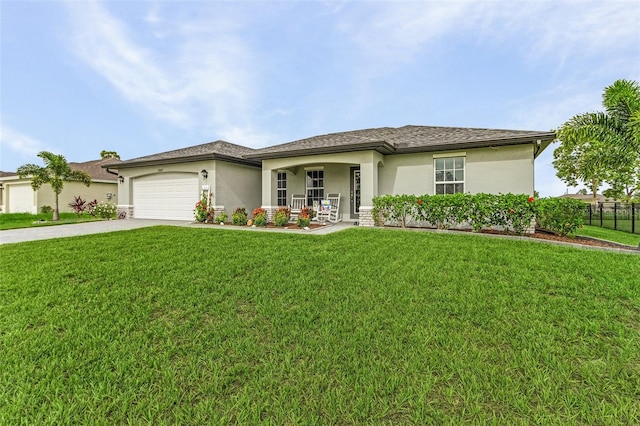 view of front facade with a garage and a front yard