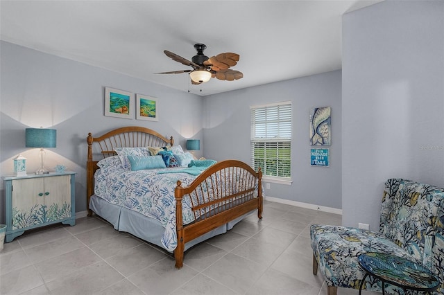 bedroom with light tile patterned flooring and ceiling fan