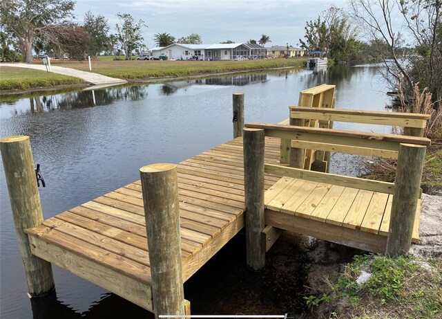 view of dock featuring a water view