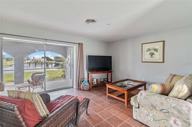 living room with tile patterned floors