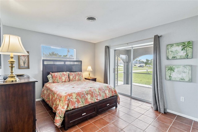 tiled bedroom with access to exterior