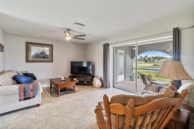 living room featuring ceiling fan