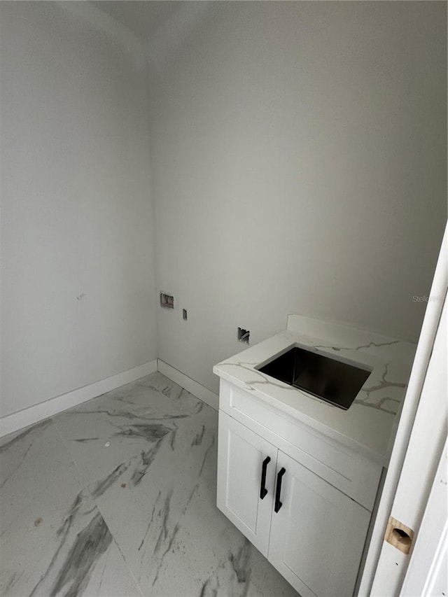 laundry area with sink