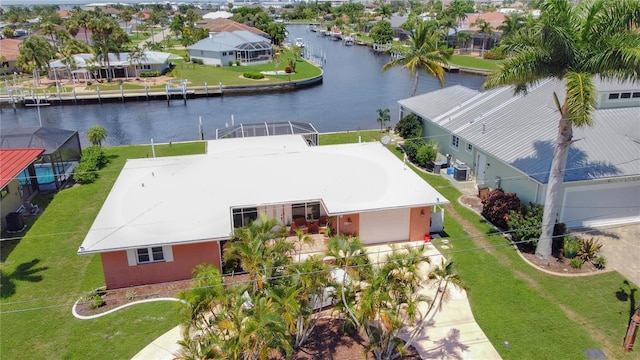 birds eye view of property featuring a residential view and a water view