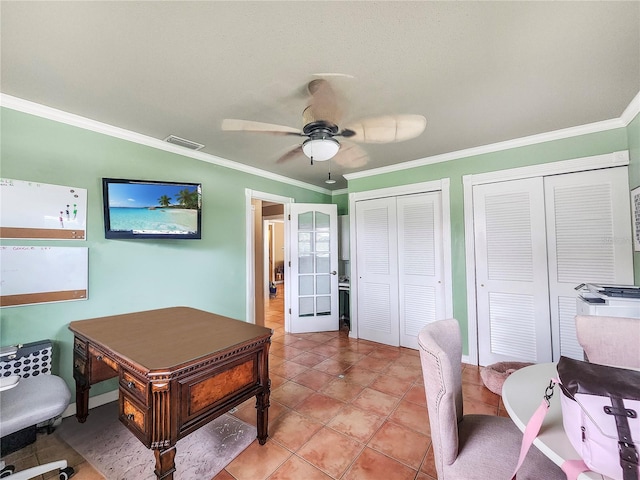 office area with crown molding, tile patterned flooring, and ceiling fan