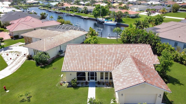 bird's eye view with a water view