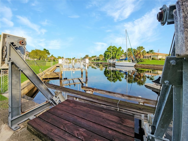 dock area featuring a water view