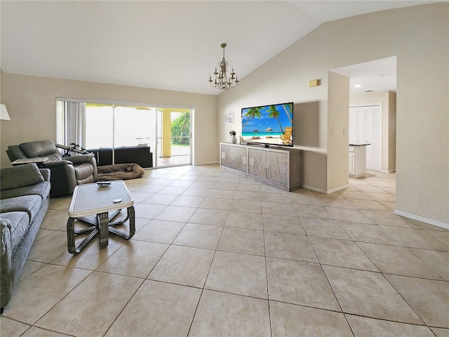 tiled living room featuring an inviting chandelier and vaulted ceiling