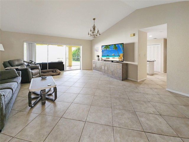 695 Coronado Dr, Punta Gorda, FL 33950 - living room featuring a notable chandelier, light tile patterned floors, baseboards, and high vaulted ceiling