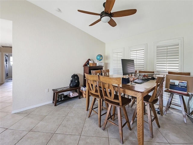 dining area with light tile patterned flooring and ceiling fan