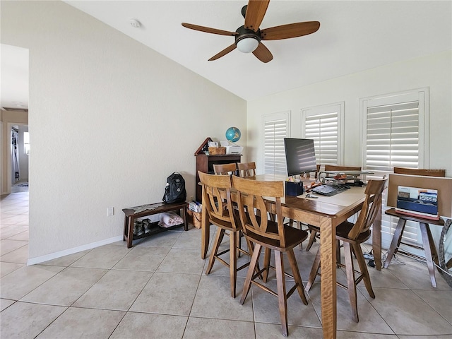 695 Coronado Dr, Punta Gorda, FL 33950 - dining area featuring vaulted ceiling, light tile patterned floors, baseboards, and ceiling fan