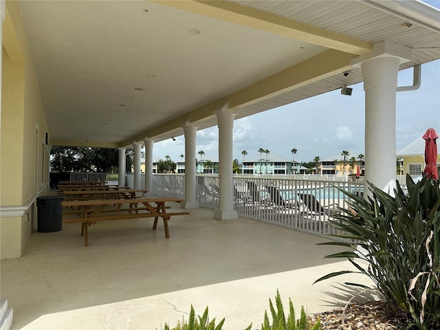 view of patio / terrace featuring a community pool