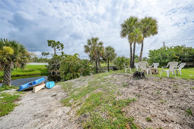 view of yard with a water view