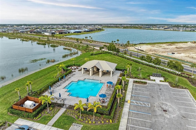 birds eye view of property featuring a water view