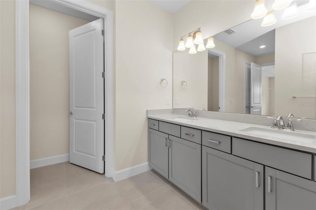 bathroom with vanity and tile patterned flooring