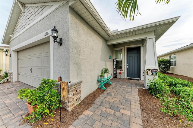 entrance to property featuring a garage