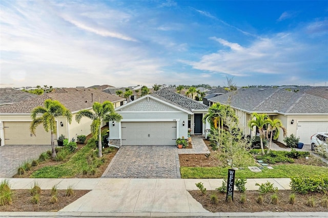 ranch-style home with a garage