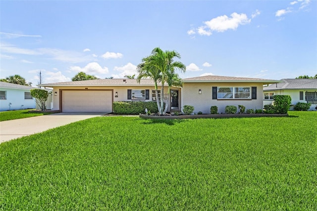 ranch-style home featuring a garage and a front lawn