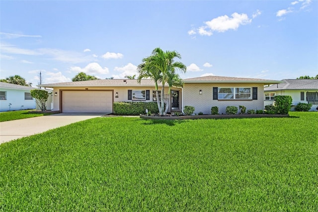 single story home featuring a garage and a front lawn