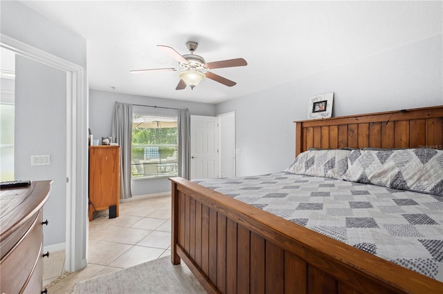 bedroom featuring ceiling fan and light tile patterned floors