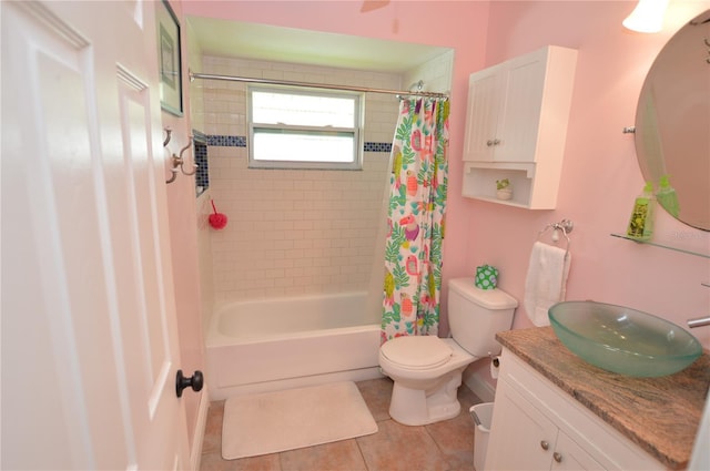 full bathroom with tile patterned flooring, vanity, toilet, and shower / tub combo