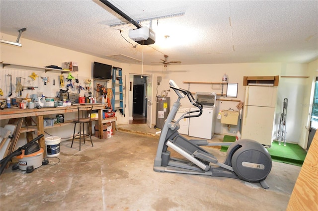 exercise room featuring a workshop area, ceiling fan, a textured ceiling, water heater, and washer / dryer